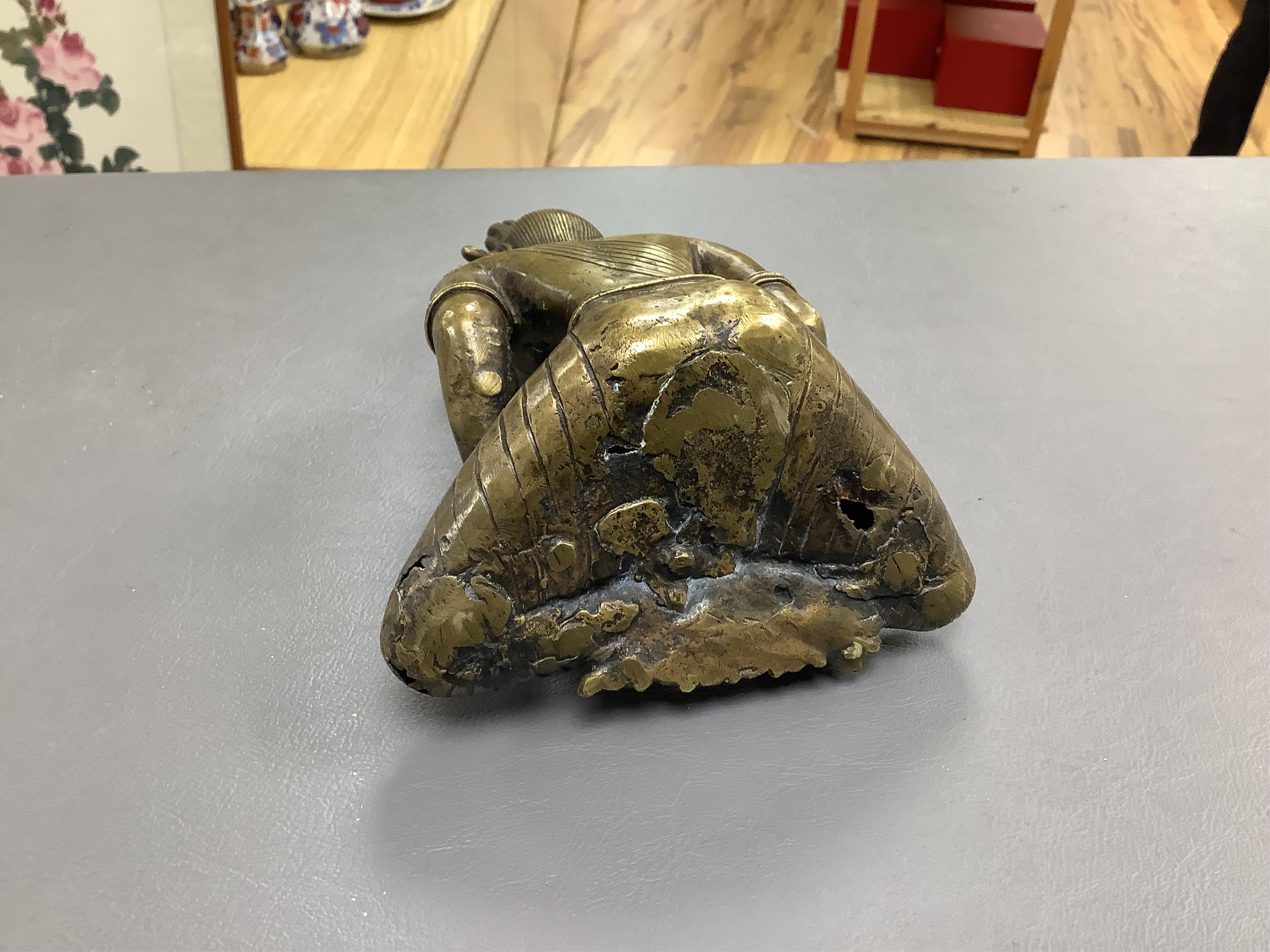 A Nepalese bronze seated figure of Avalokiteshvara, 19th century, 18cm high